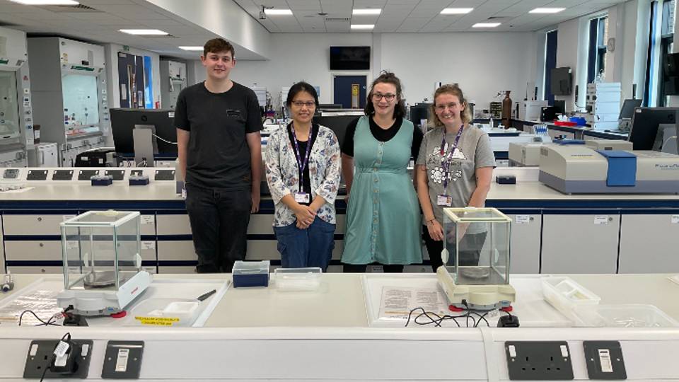 Four students in a laboratory