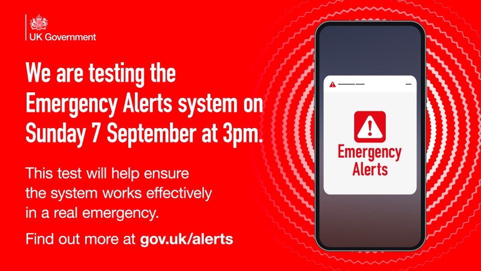 An emergency alert poster from the UK Government. It pictures a phones with an emergency alert on the screen. It has a red background and white text 'We are testing the Emergency Alerts System on Sunday 7 September at 3pm.'