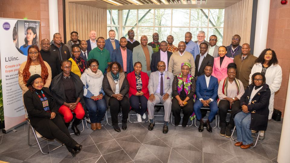 Photo of representatives from the Department for Business and Trade along with delegates from Sub-Saharan Africa sat inside in the Holywell Building