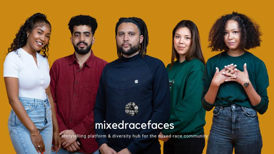 a group of people stood together facing the camera with an orange background and the mixedracesfaces logo at the bottom