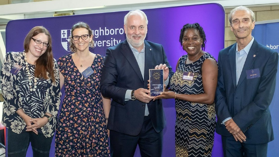 colleagues from inclusive engineering hub holding award with the Vice-Chancellor