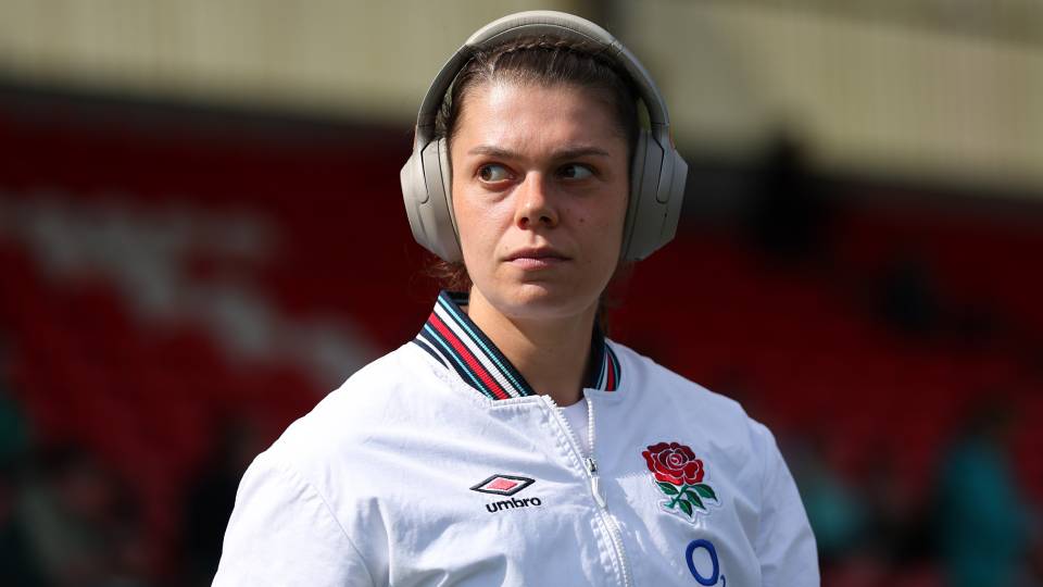rugby player helena rowland wearing headphoness pre match